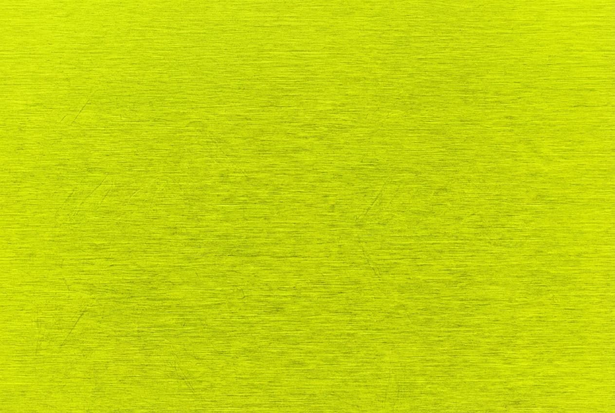 Seamless brushed-steel texture in neon yellow